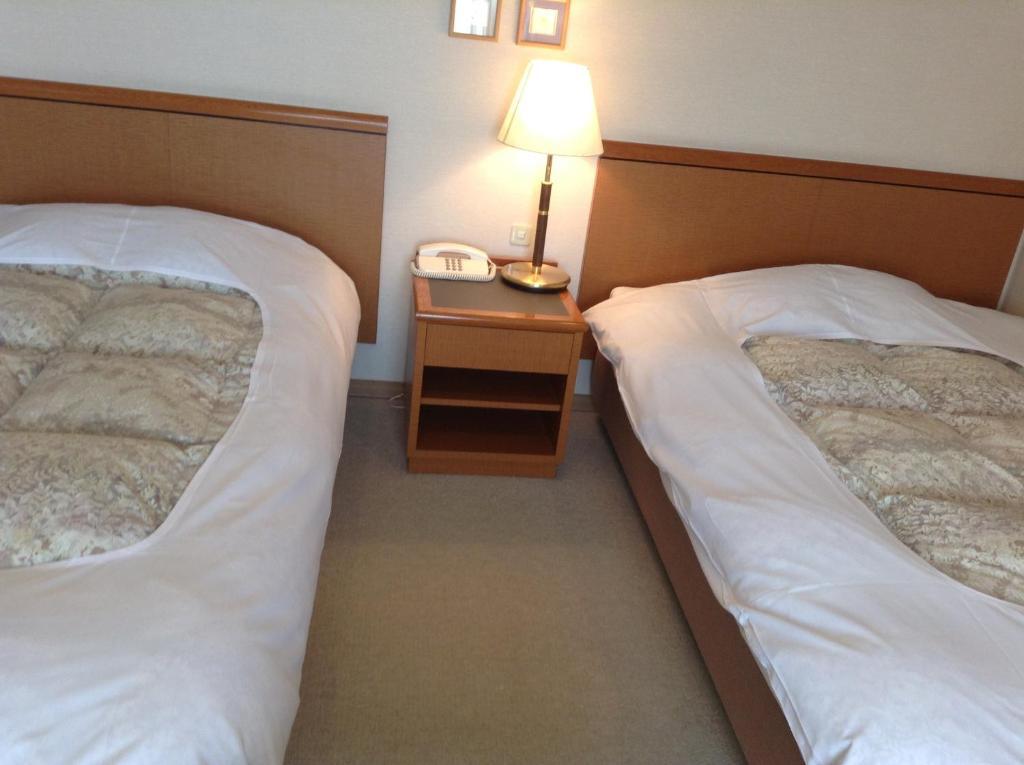 Bergtour Marukita Hotel Hakuba Bagian luar foto