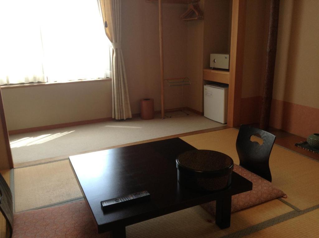 Bergtour Marukita Hotel Hakuba Bagian luar foto