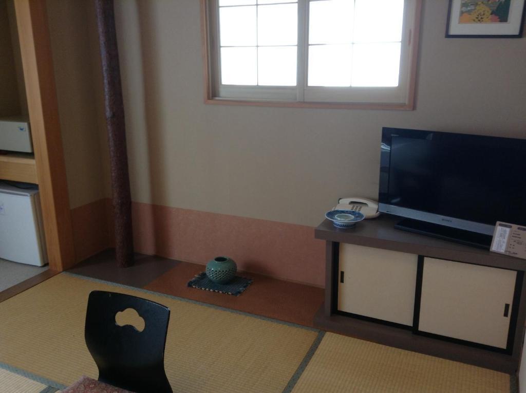 Bergtour Marukita Hotel Hakuba Bagian luar foto