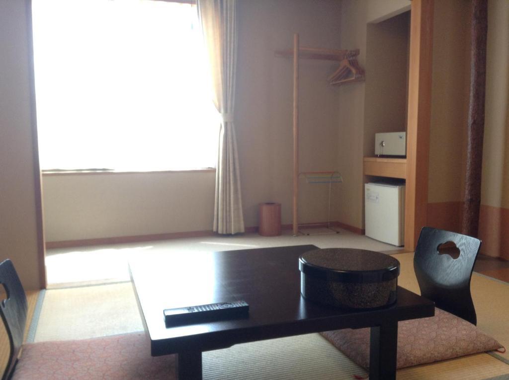 Bergtour Marukita Hotel Hakuba Bagian luar foto