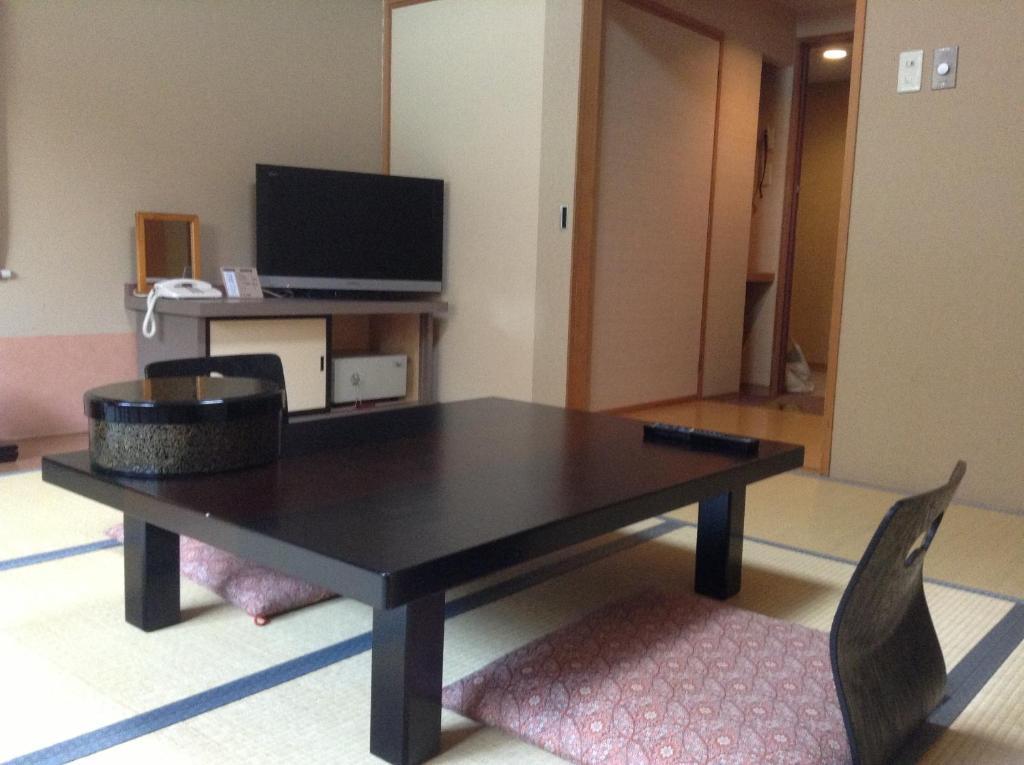 Bergtour Marukita Hotel Hakuba Bagian luar foto