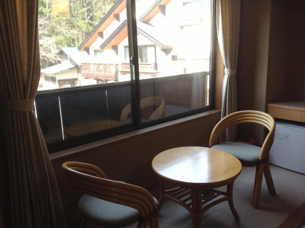 Bergtour Marukita Hotel Hakuba Bagian luar foto