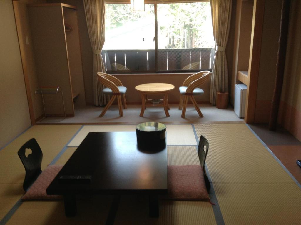 Bergtour Marukita Hotel Hakuba Bagian luar foto