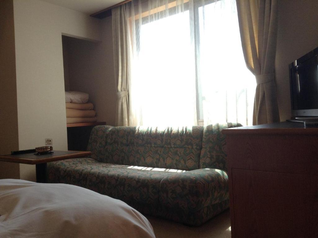 Bergtour Marukita Hotel Hakuba Bagian luar foto